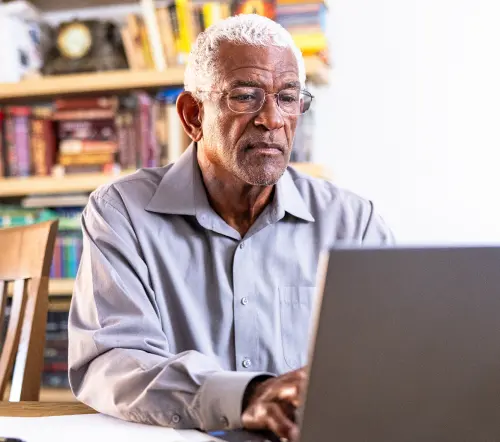 Senior man using a laptop